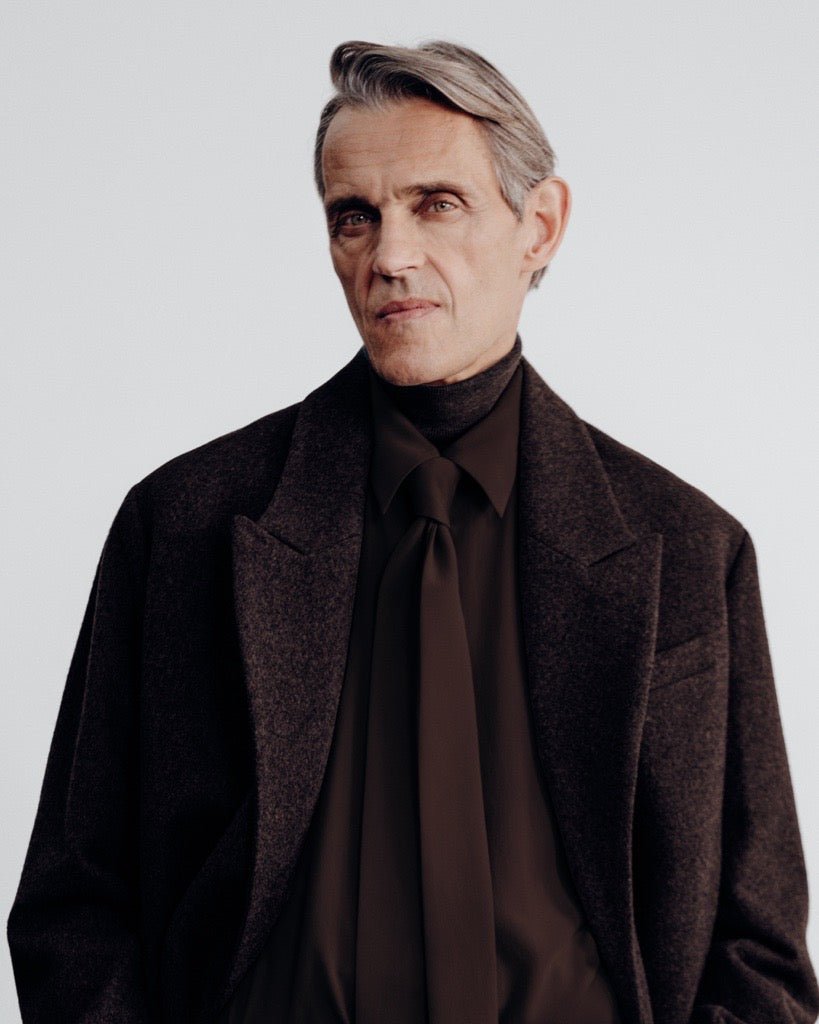 close-up portrait of man, charcoal silk shirt and tie
