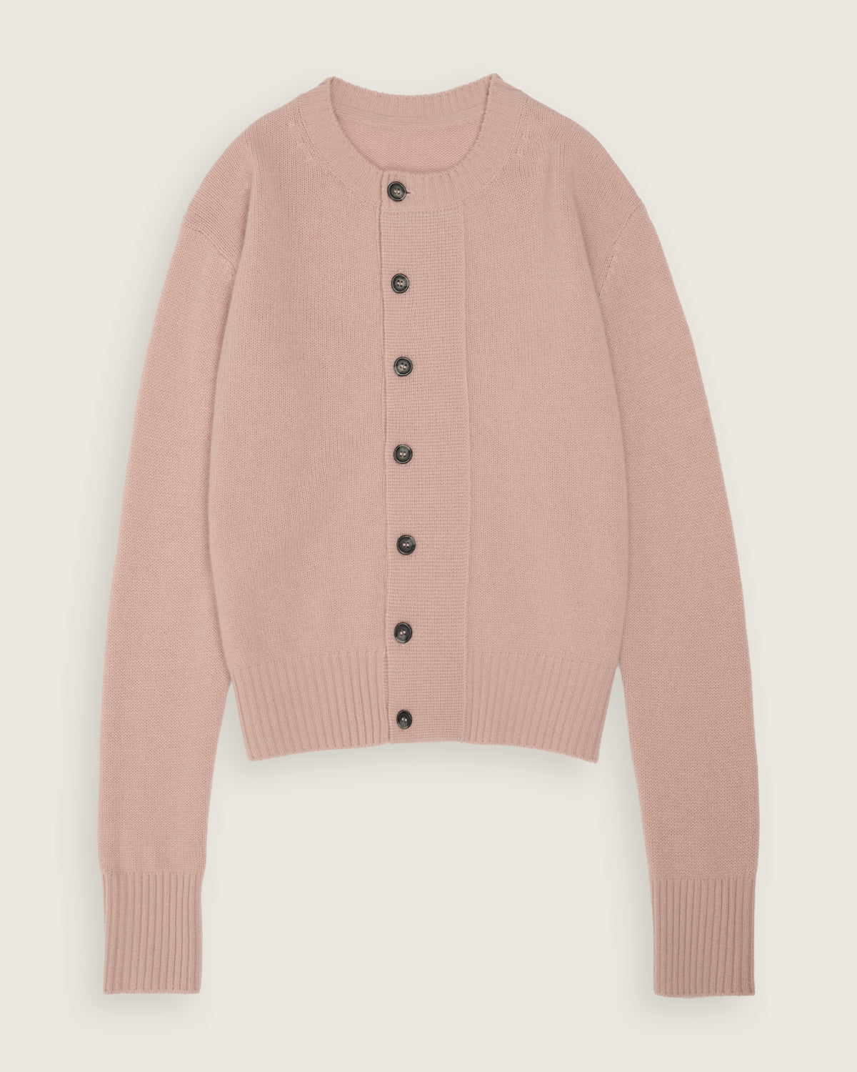 flat lay of the blush pink cropped cardigan