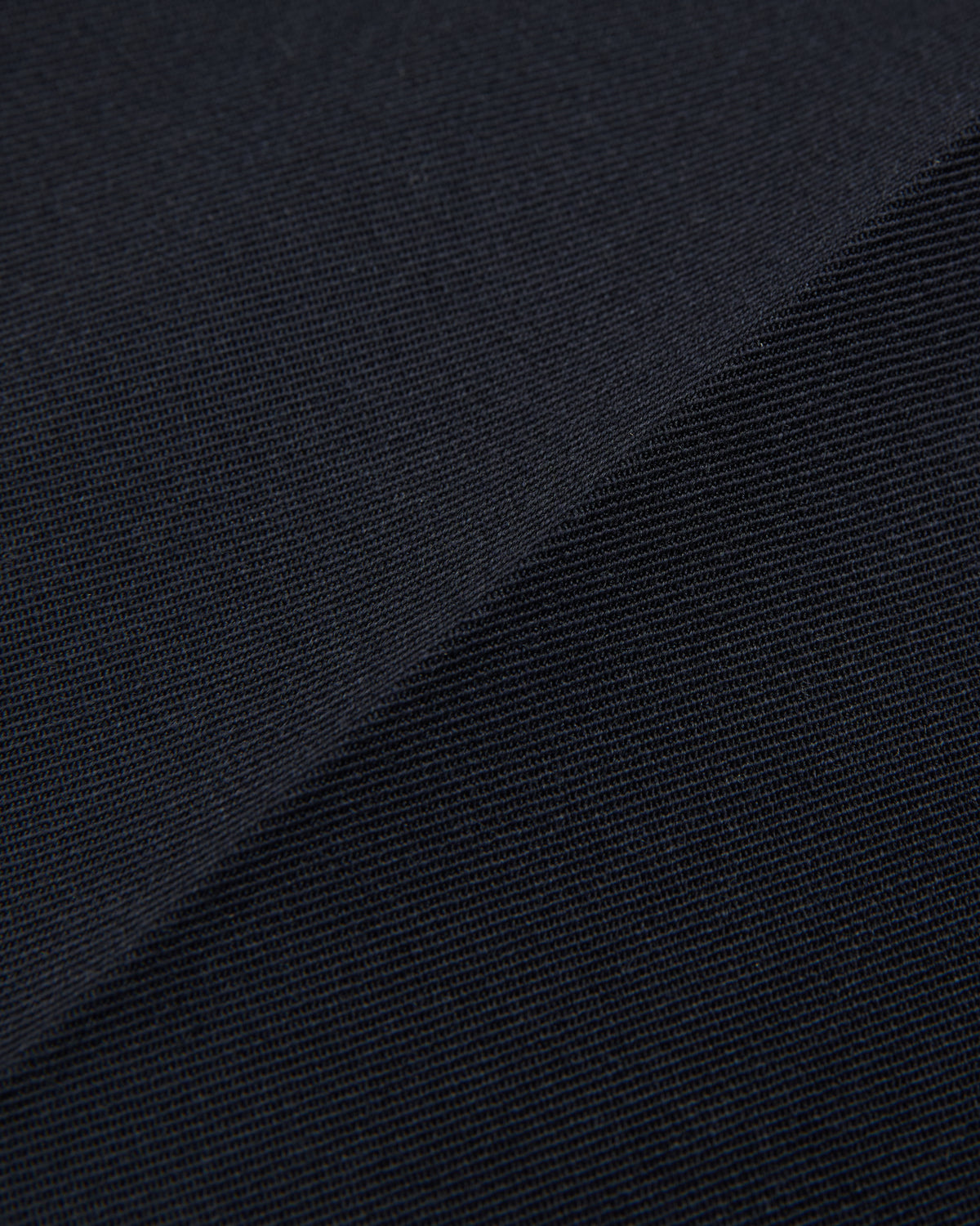 close-up of the navy tailored pant fabric