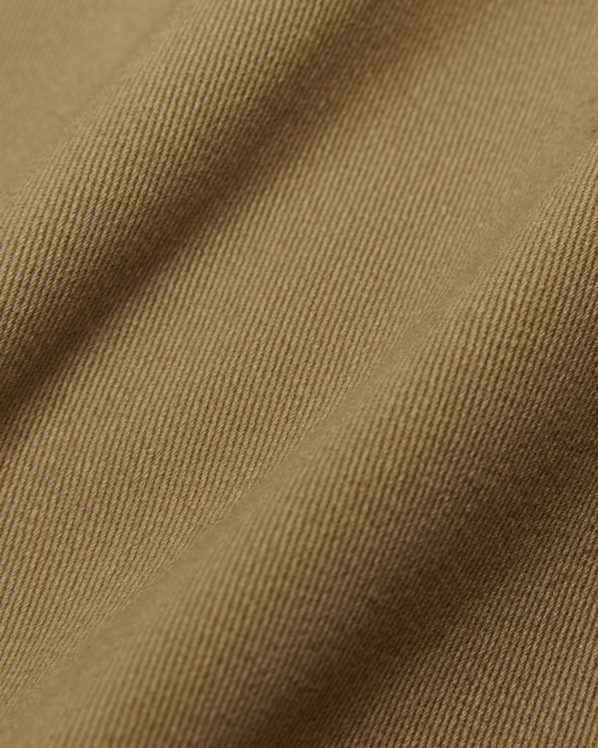 close-up of the sand cotton bomber fabric
