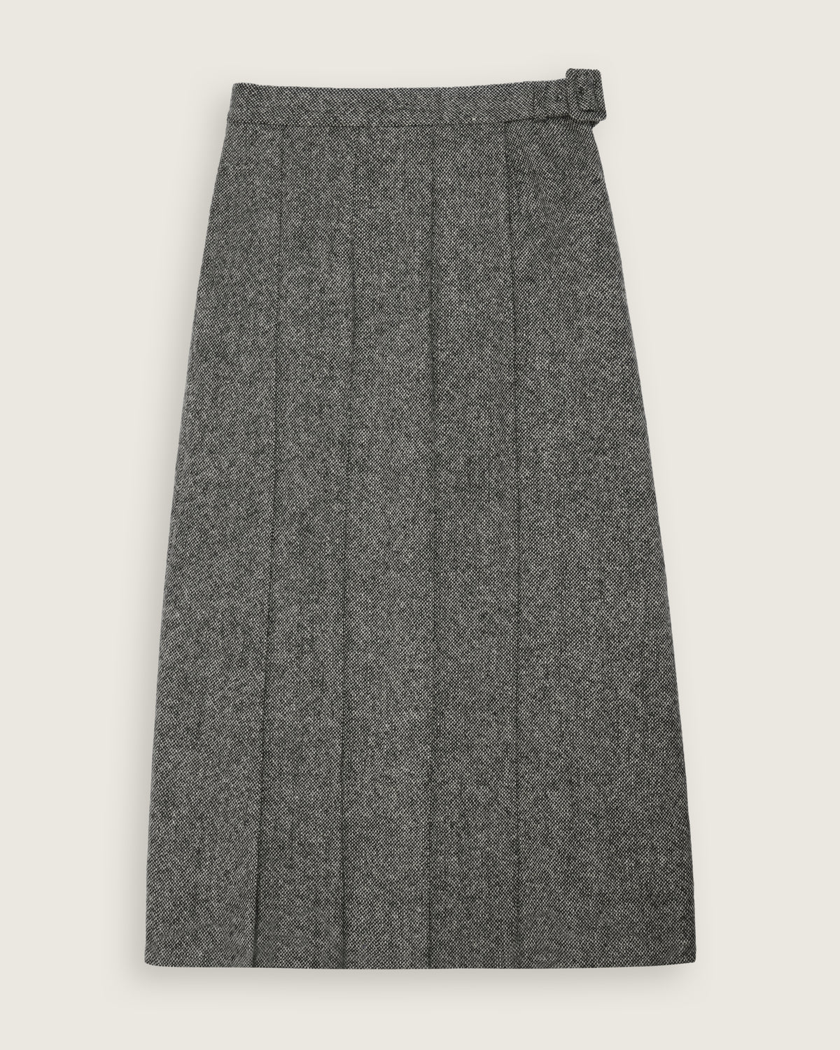flat lay of the black and white asymmetric pleated skirt