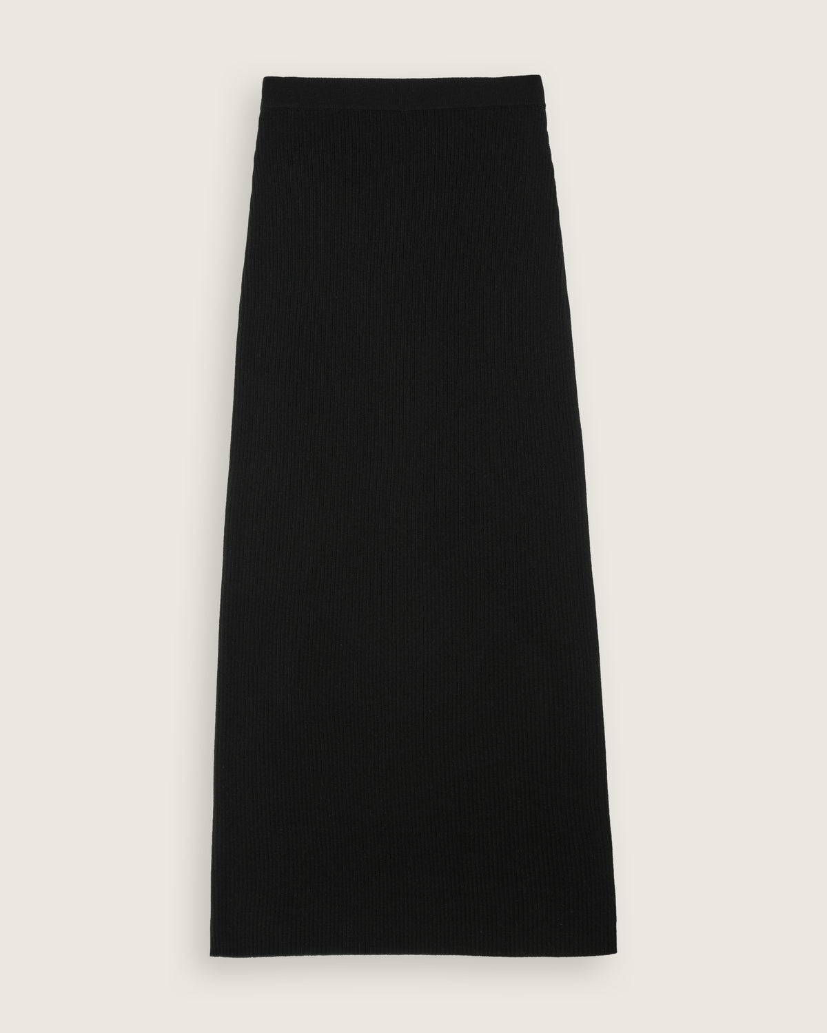 flat lay of the black ribbed column midi skirt