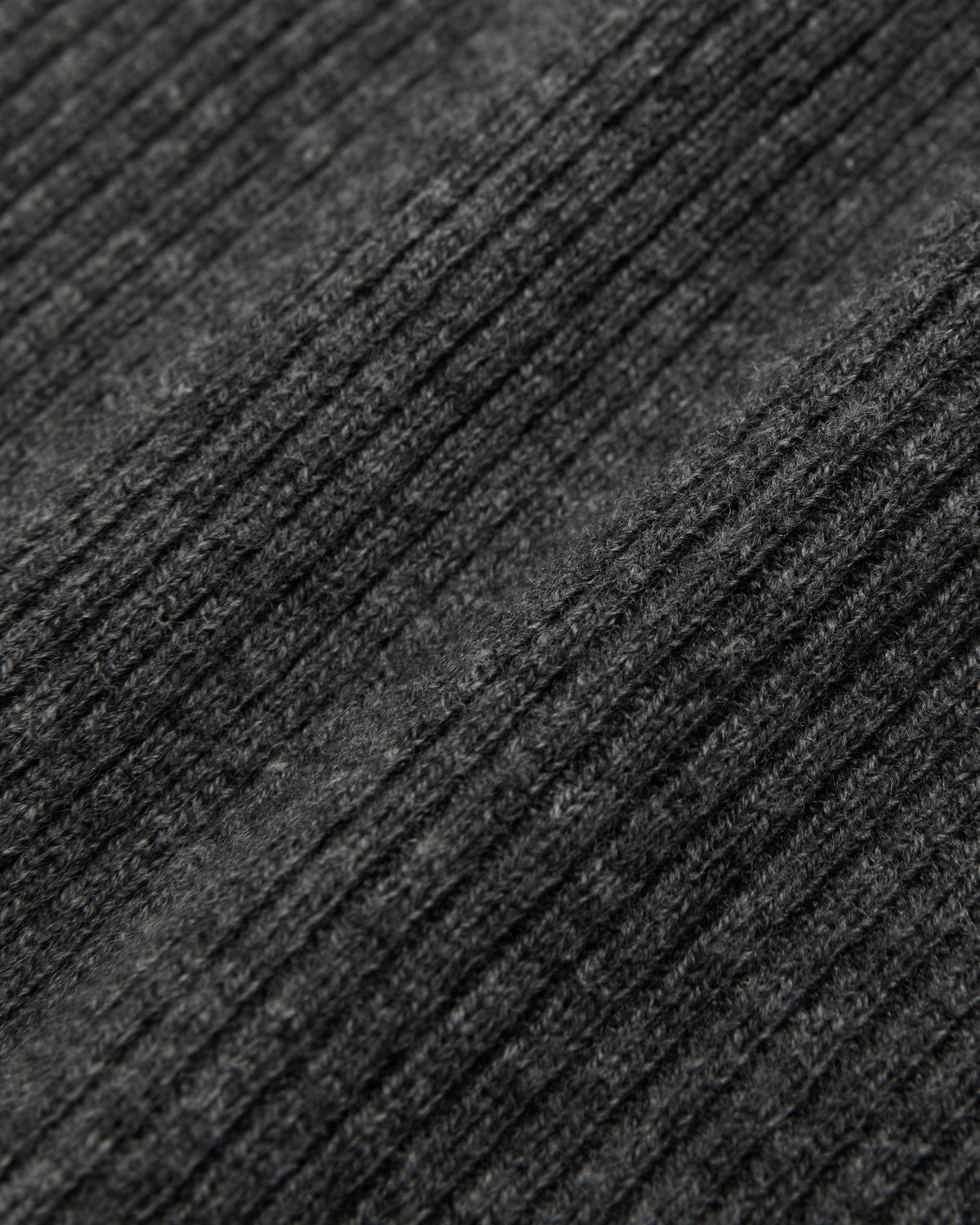 close-up of the charcoal grey midi skirt knit fabric