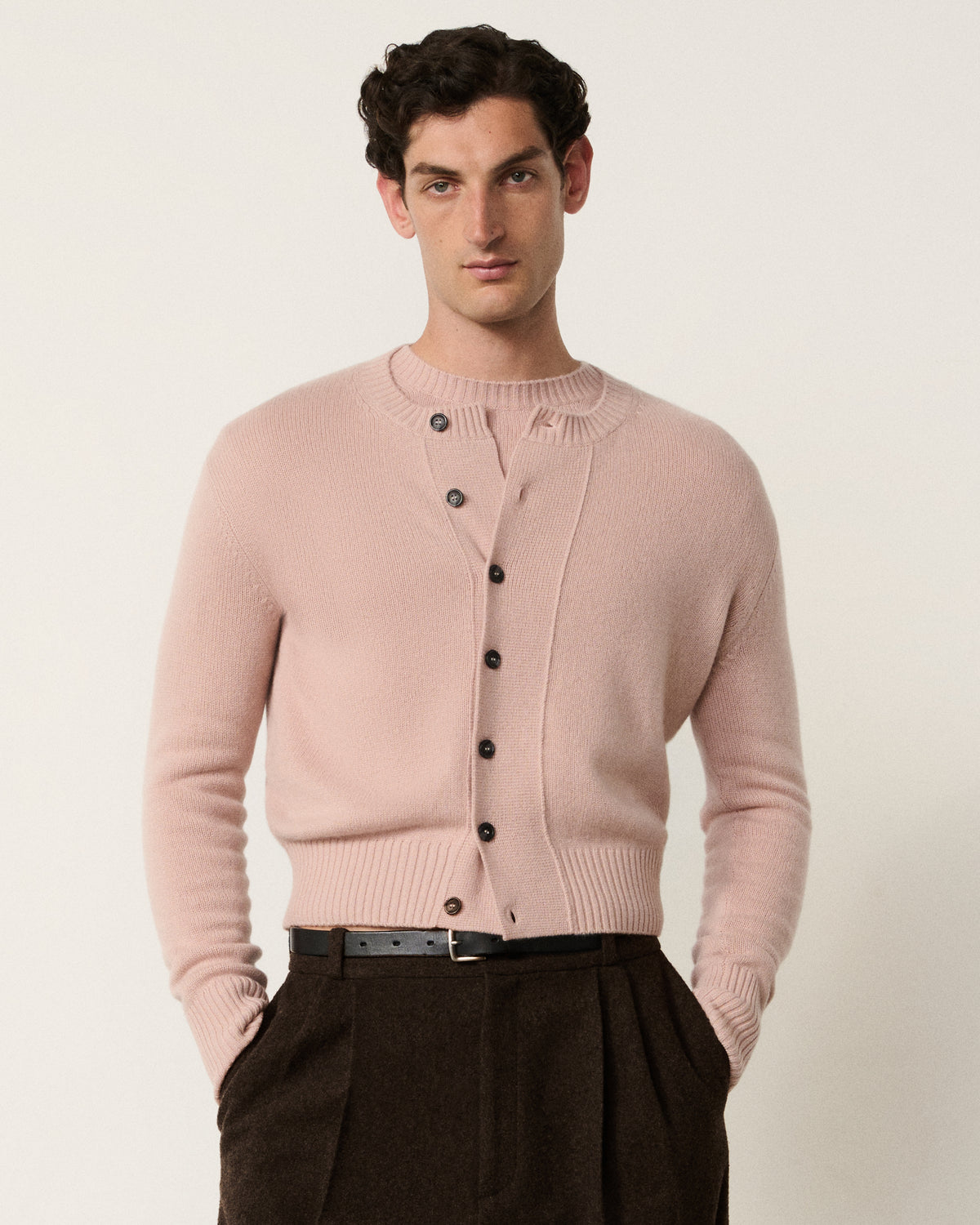 man in the blush pink cropped cardigan, front view