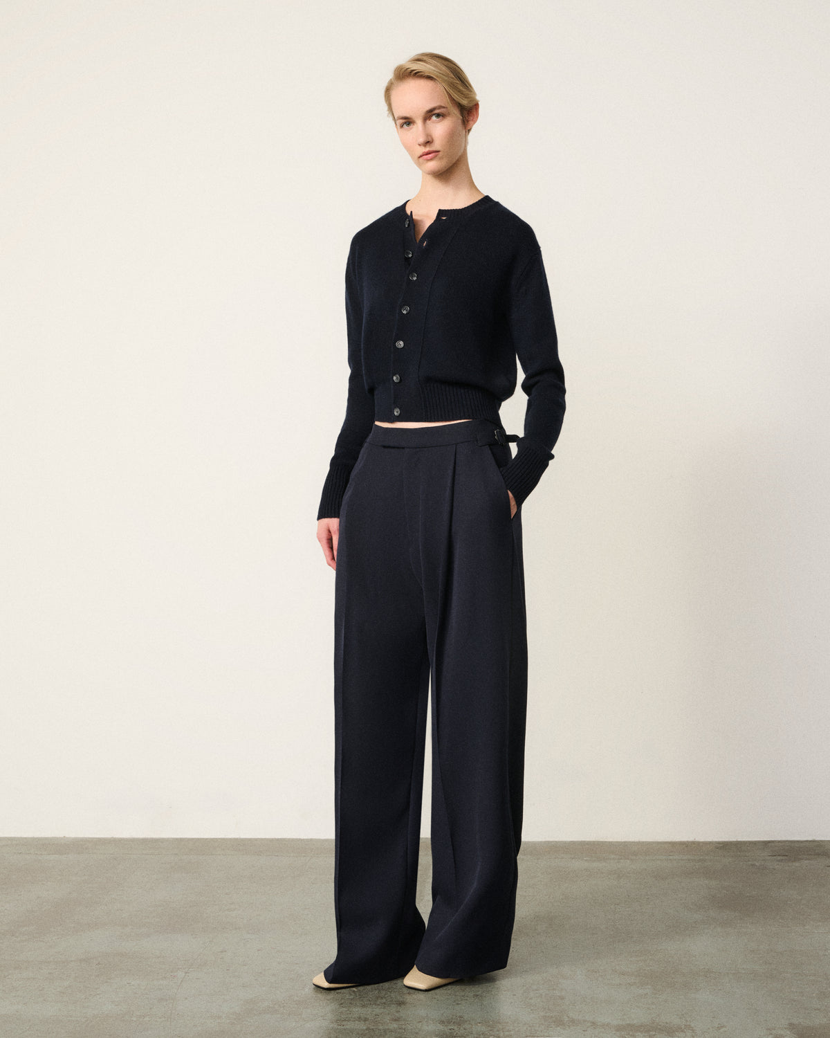 woman wearing the midnight navy cropped cardigan