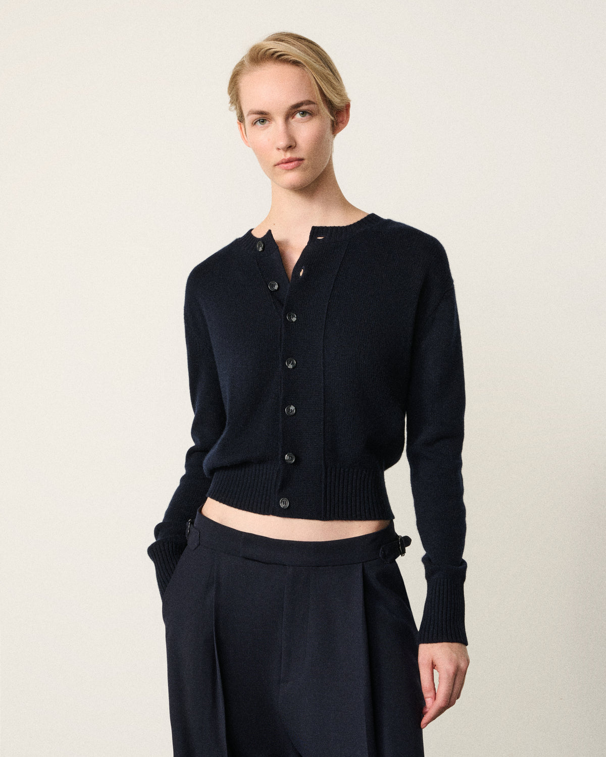 woman wearing the midnight navy cropped cardigan
