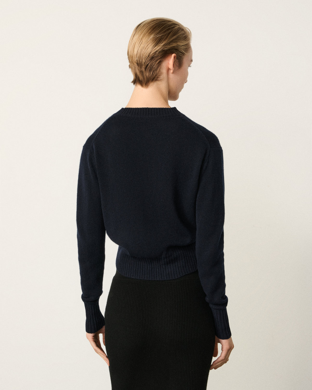 woman back view, midnight navy cropped sweater