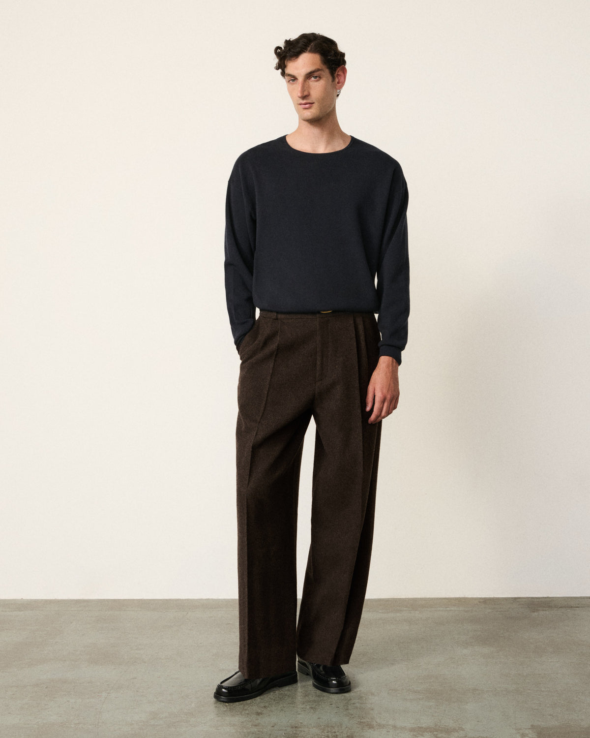 man wearing the indigo milano knitted sweatshirt