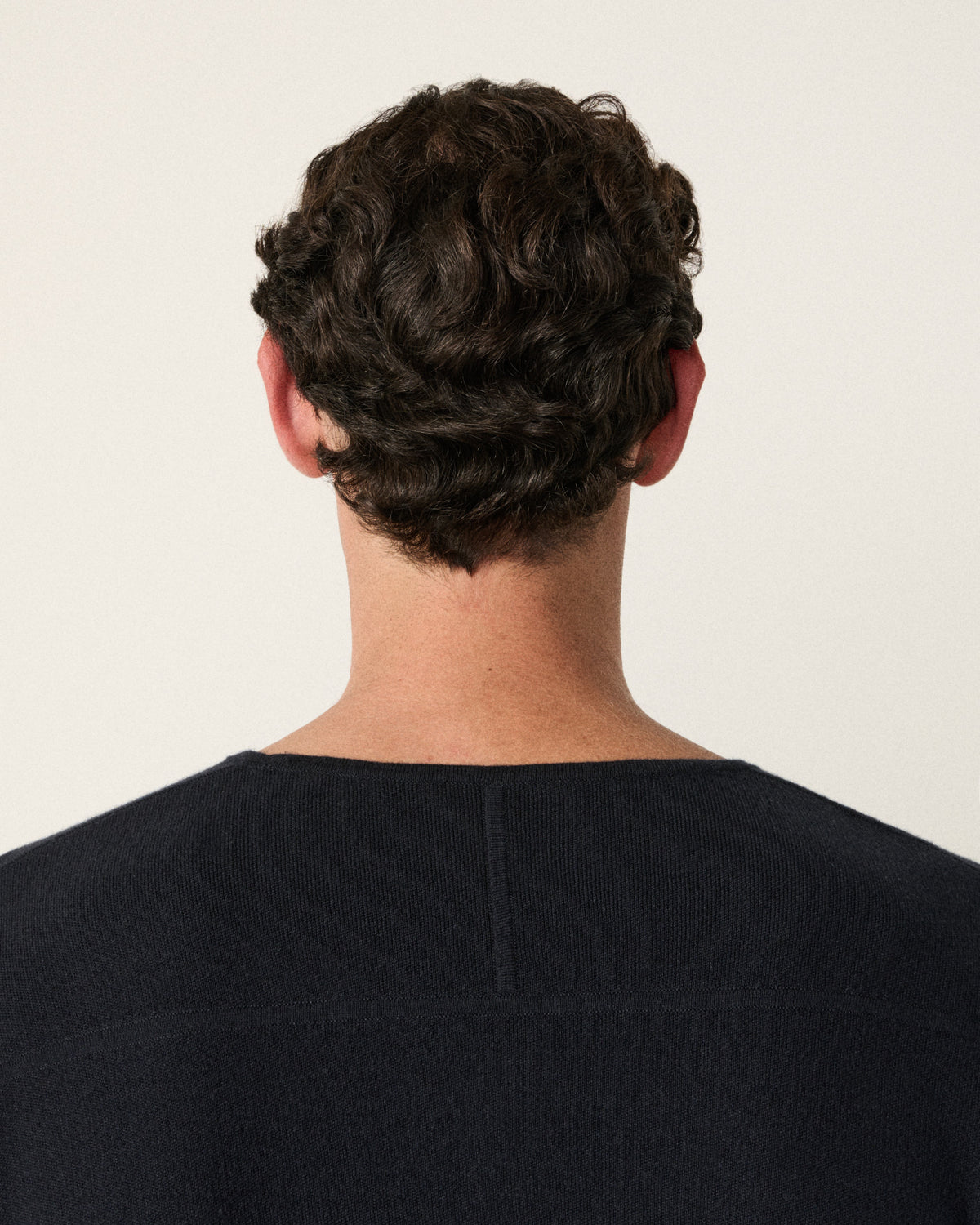 close-up of a man's neck and collar on the sweatshirt