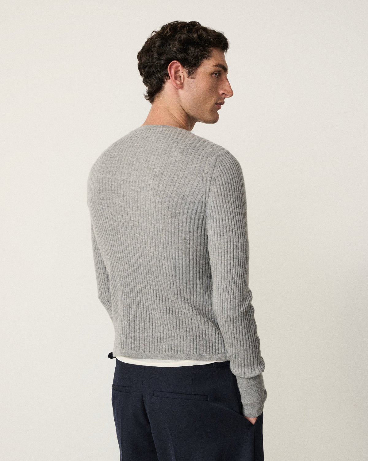 man back view, light grey ribbed henley