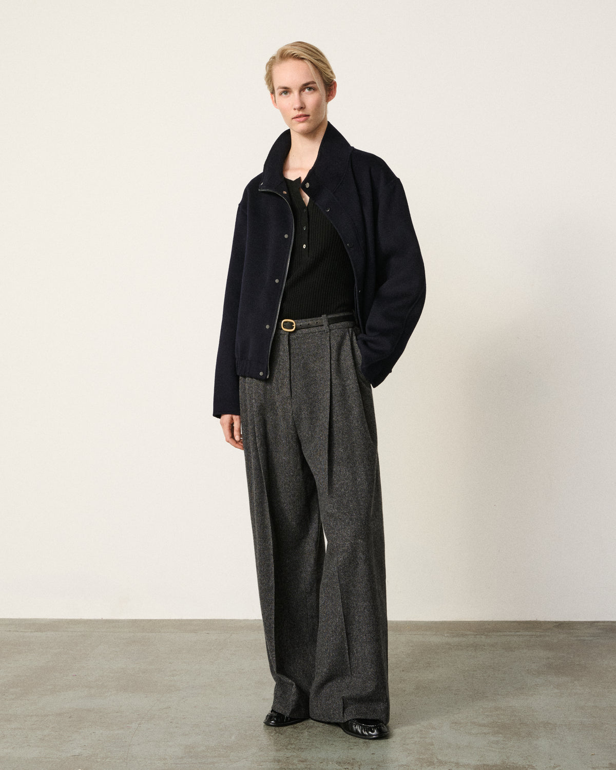 woman full body front, dark navy cropped bomber