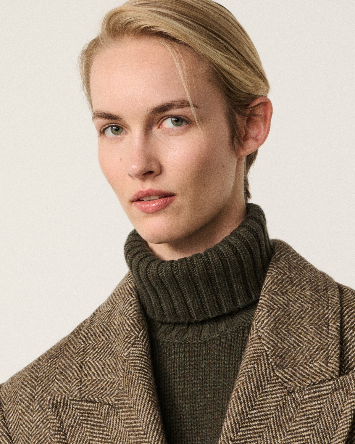 close-up of woman's face, crombie coat