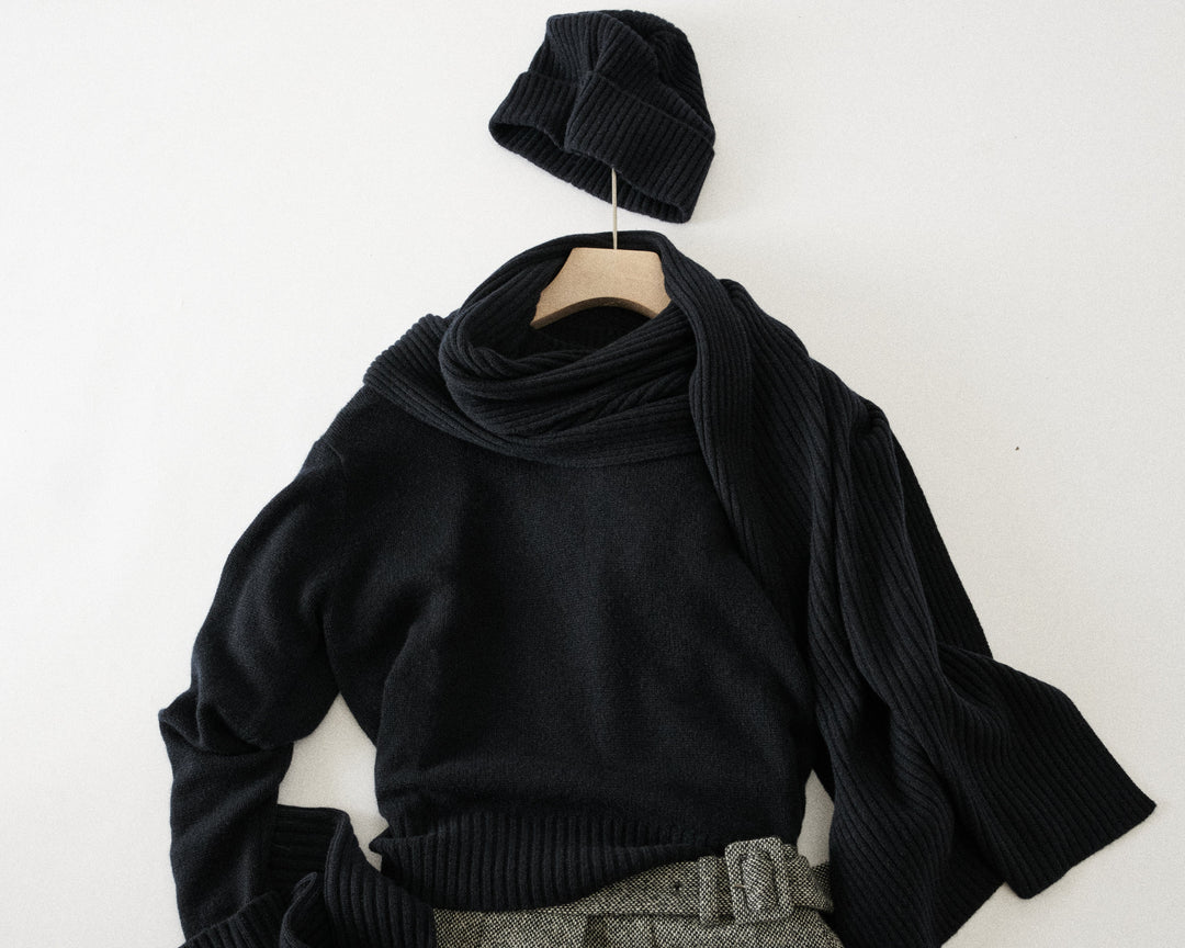 styled flat lay with scarf and beanie