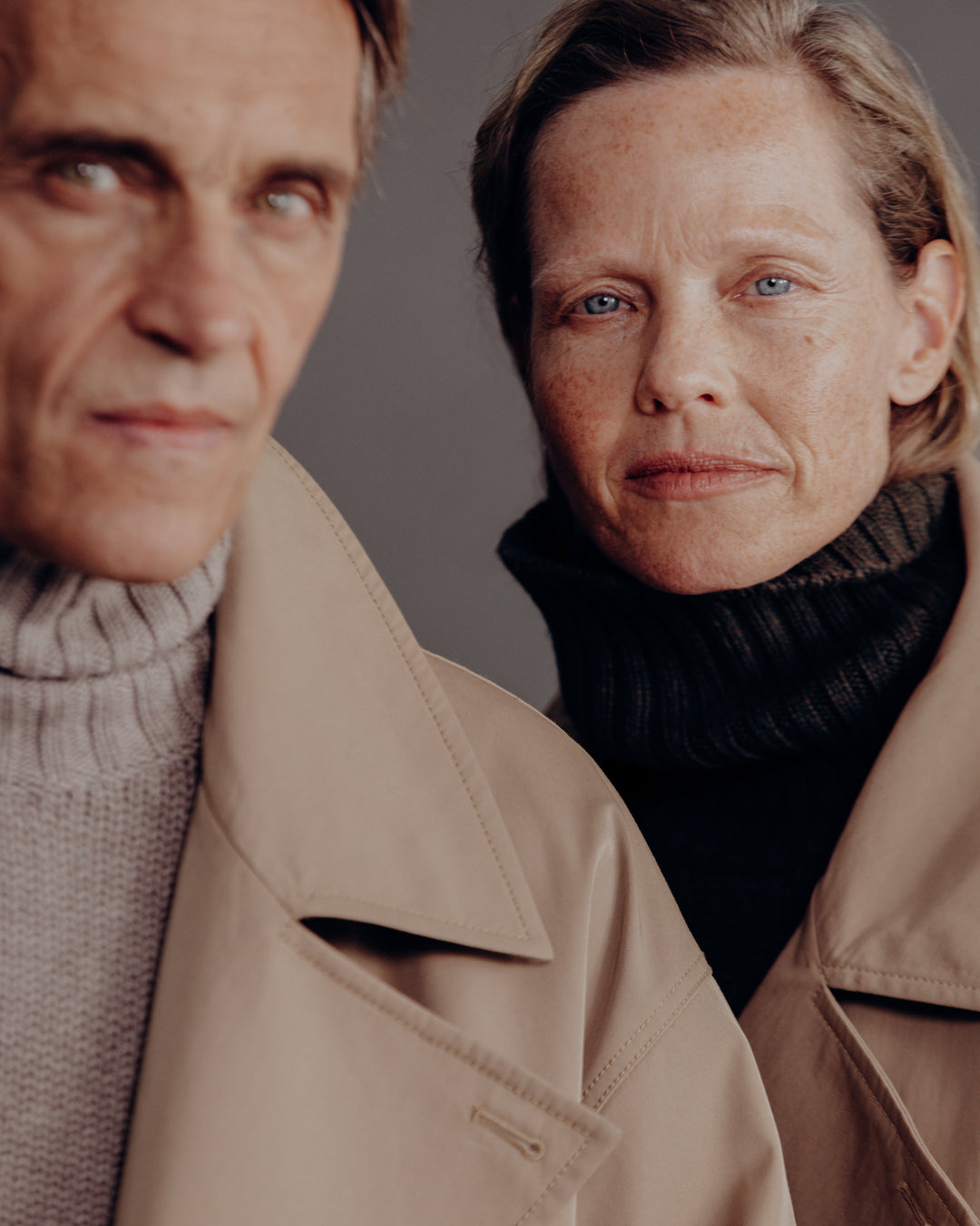 man and woman wearing the mink turtle neck sweater